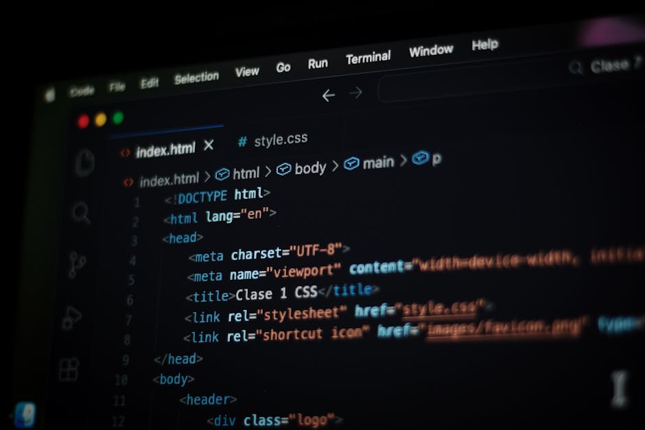 A close-up of a computer screen displaying HTML code within a text editor, showing tags such as <html>, <head>, <title>, and <body>. The code appears to be part of a webpage related to landscaping or